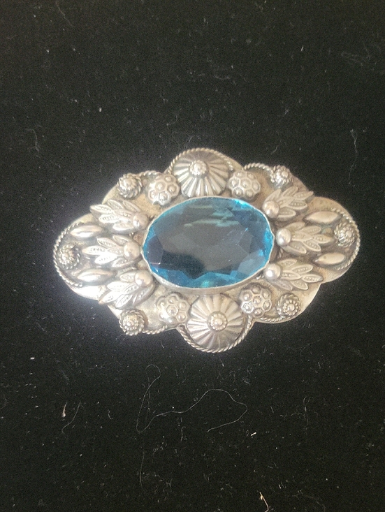 Jewelry - Silver-Tone Floral Brooch with Blue Oval Gem